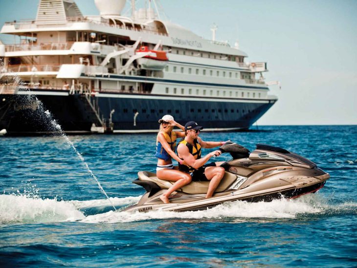 Taking the jet ski for a spin while cruising with SeaDream.