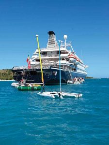 seadream marina with catamarans, dinghies and jet skis.