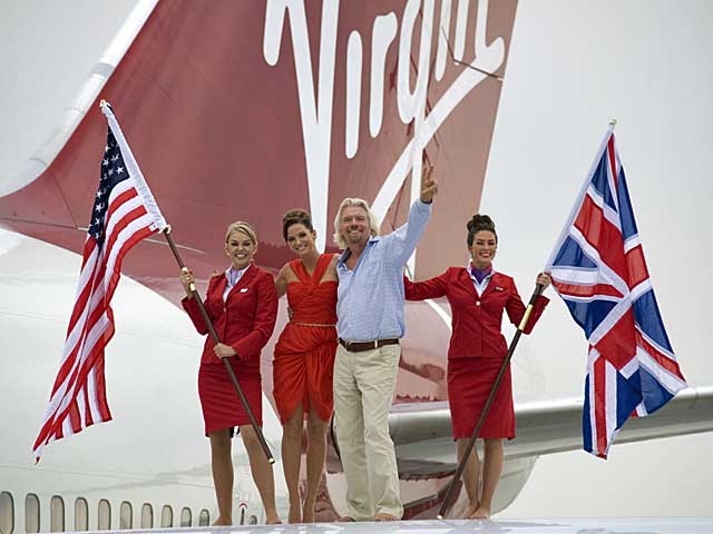 Sir Richard Branson celebrating 25 years on the London-Miami route with Sarah Harding