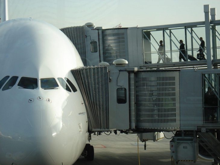 Air France A380 parked at gate.