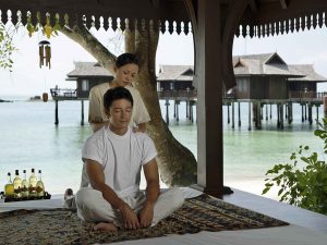 Getting a Thai massage at Pangkor Laut Reosrt, Malaysia.