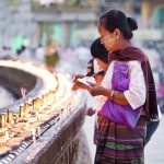 Women saving prayers at Schwedagon Pagoda in Yangon, Myanmar (aka Burma)