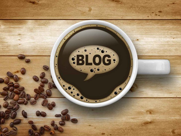 coffee cup with the word blog written in foam