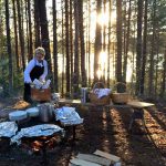 Chef preparing an outdoor lunch at Camp Sävenfors, Sweden.