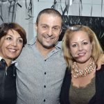 Greg Peter Patrikios, the founder of CIOOA, surrounded by 2 ladies.