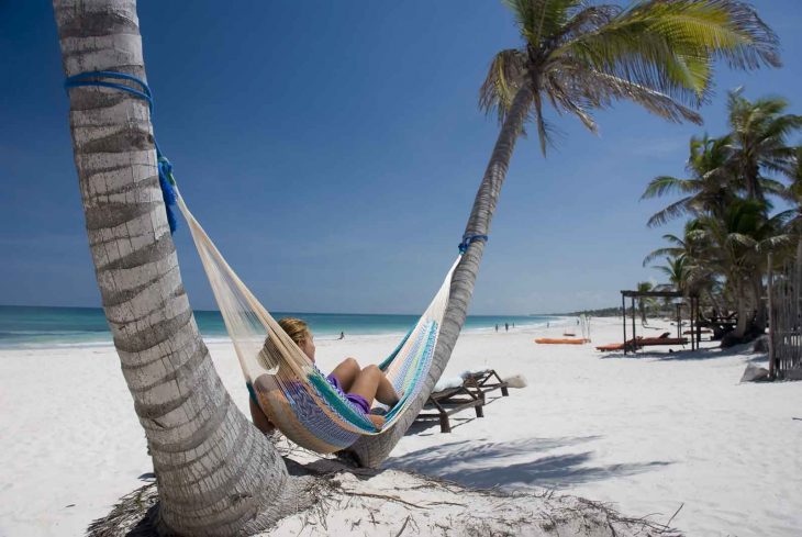 Hammock on a tropical beach. Looks good, doesn´t it?