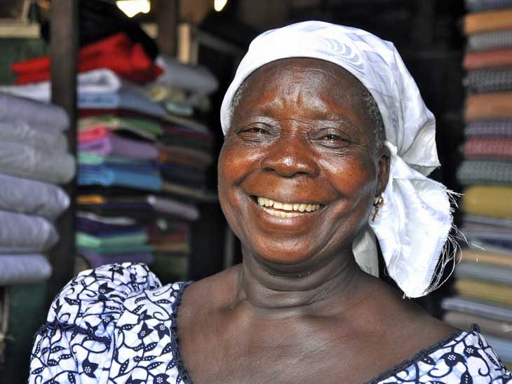 Smiling woman in Ghana.