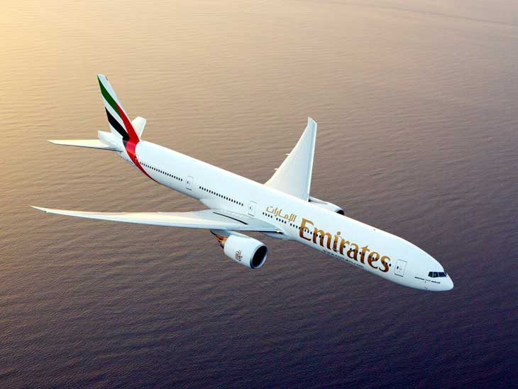 Emirates Boeing 777-300ER in the air.