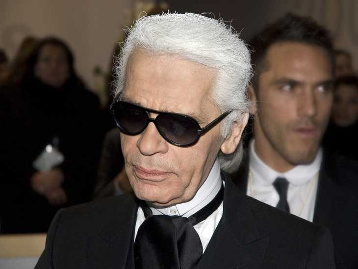 Karl Lagerfeld with his body guard, who also has modelled for KL.
