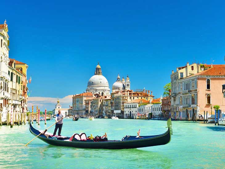 Gondola on the canals of Venice.