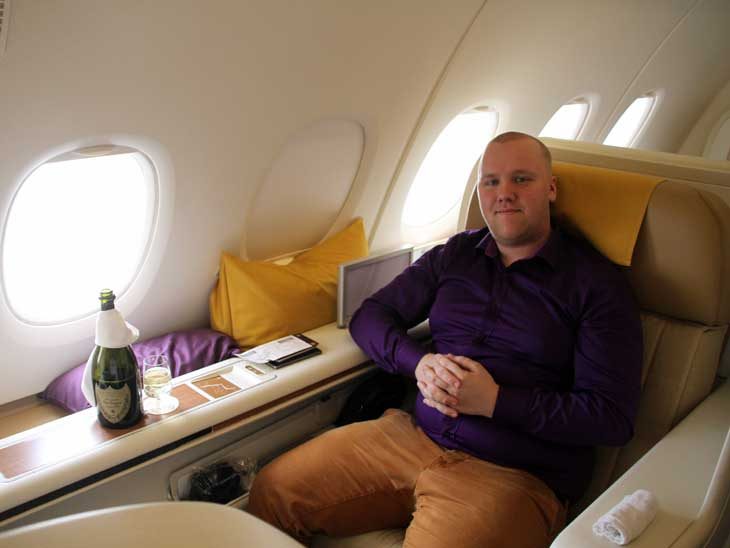 Simon relaxing with a glass of champagne.