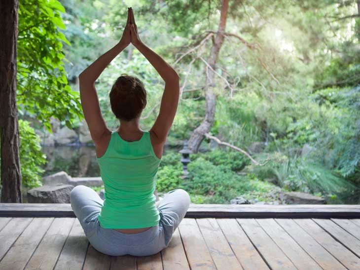 Woman doing yoga.