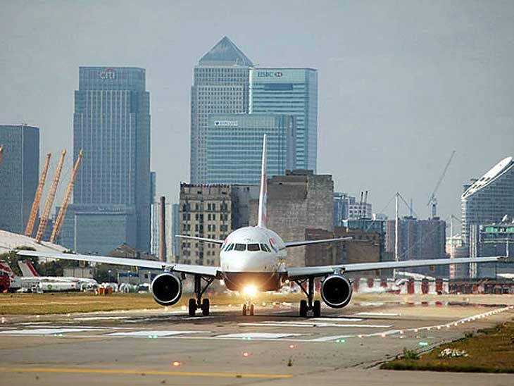 BA A318 on the runway at London City Airport.