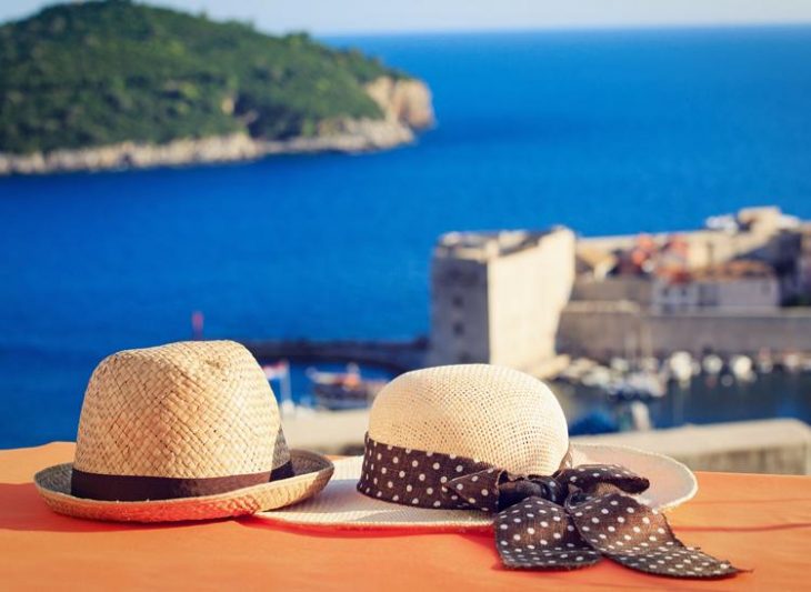 his and her hat with a view