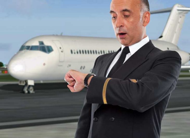 MD-80 pilot looking at his watch. In a hurry?
